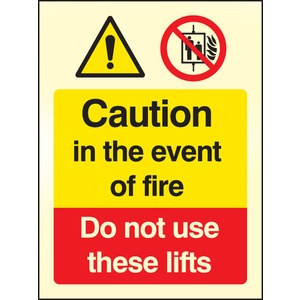 Caution In The Event of Fire Do Not Use These Lifts  - Rigid Photolum Sign